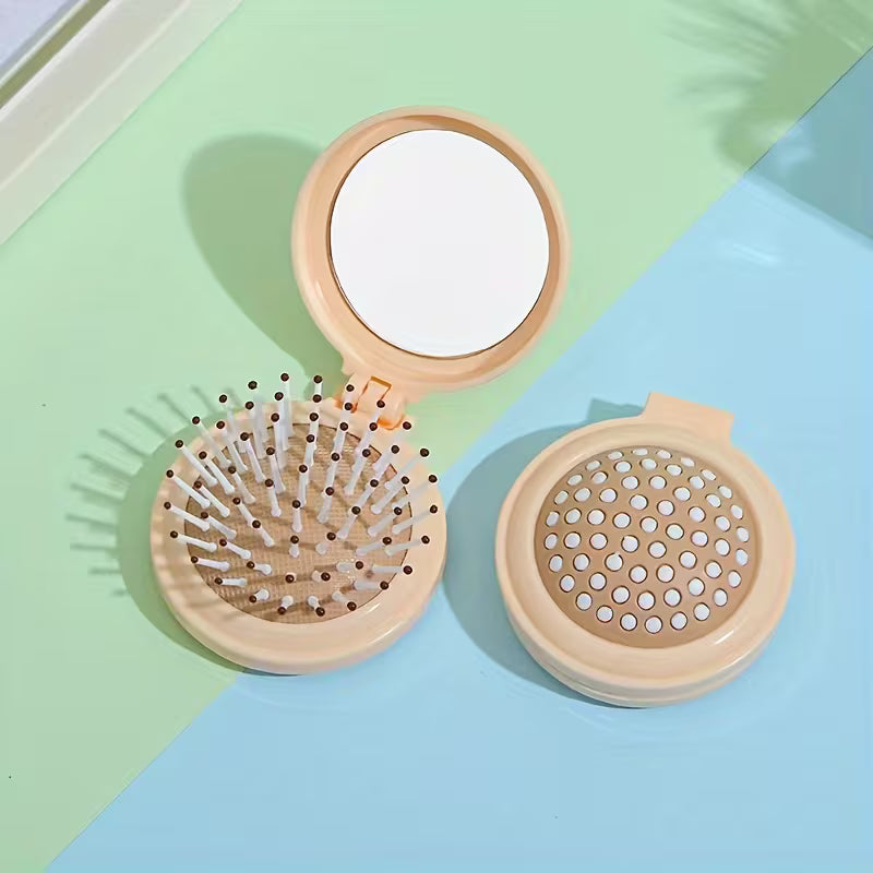 Compact travel hair brush with mirror