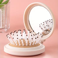 Compact travel hair brush with mirror